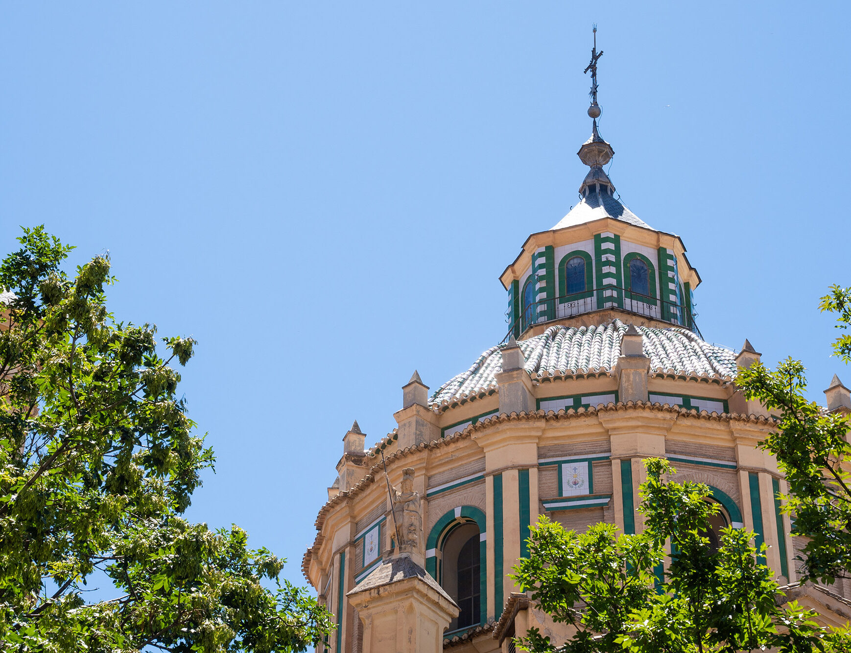 Colorful decorated tower building in Seville.