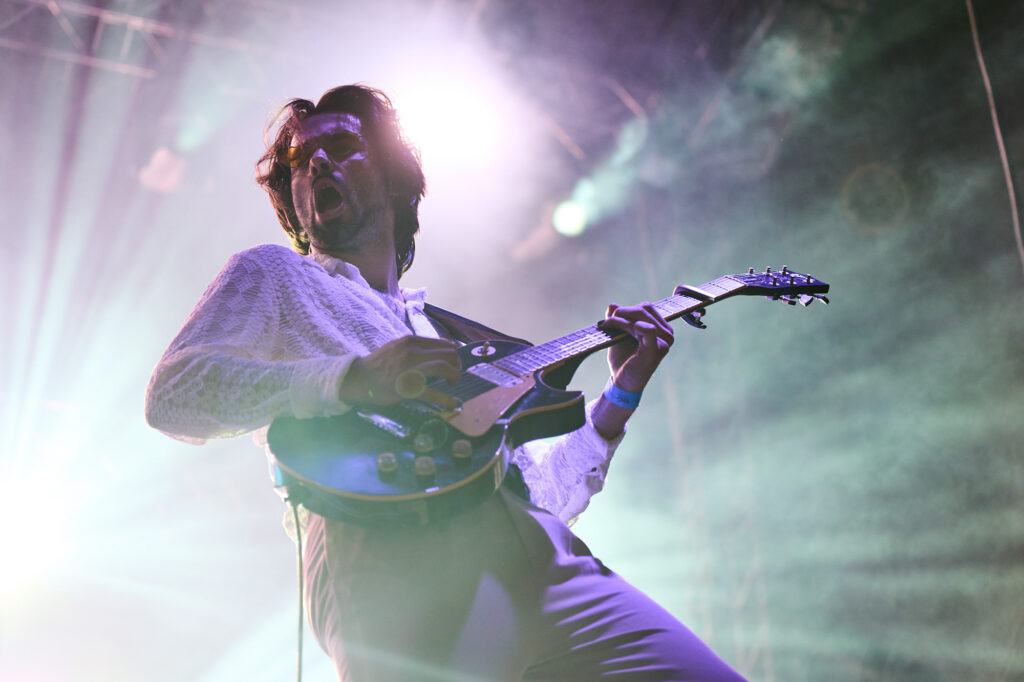 An event photo of a guitarist of a music band Joker Out taken in Maribor for Dostop.